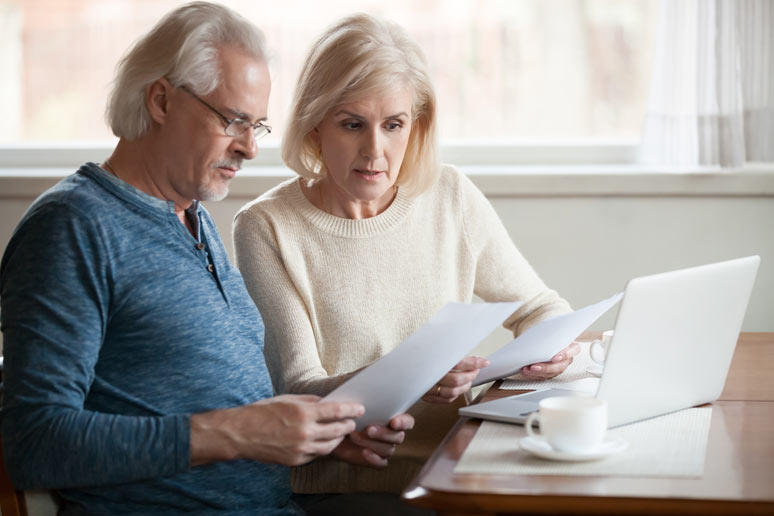 Older Couple Reviewing Finances